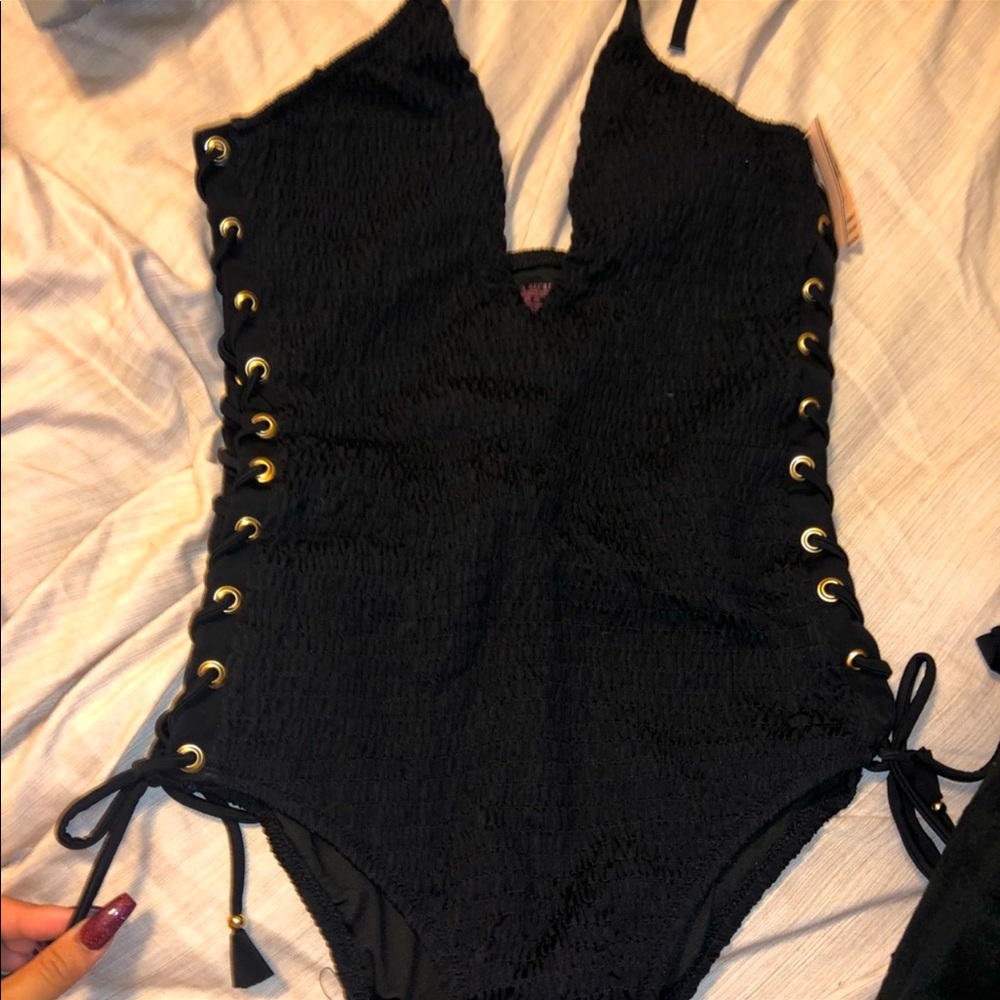 Black one piece baiting suit. Victoria secret